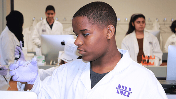 An image of high school students in a lab.
