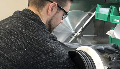 Photo of a student in a fabrication lab.