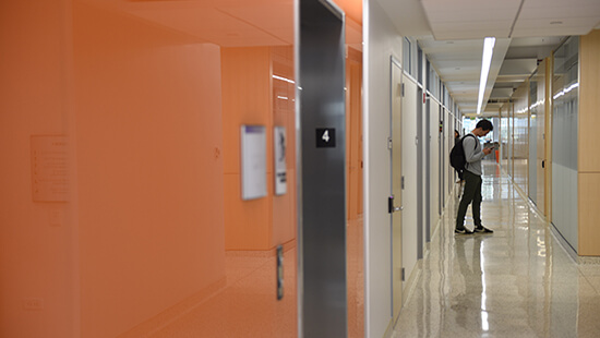 Student in a hallway